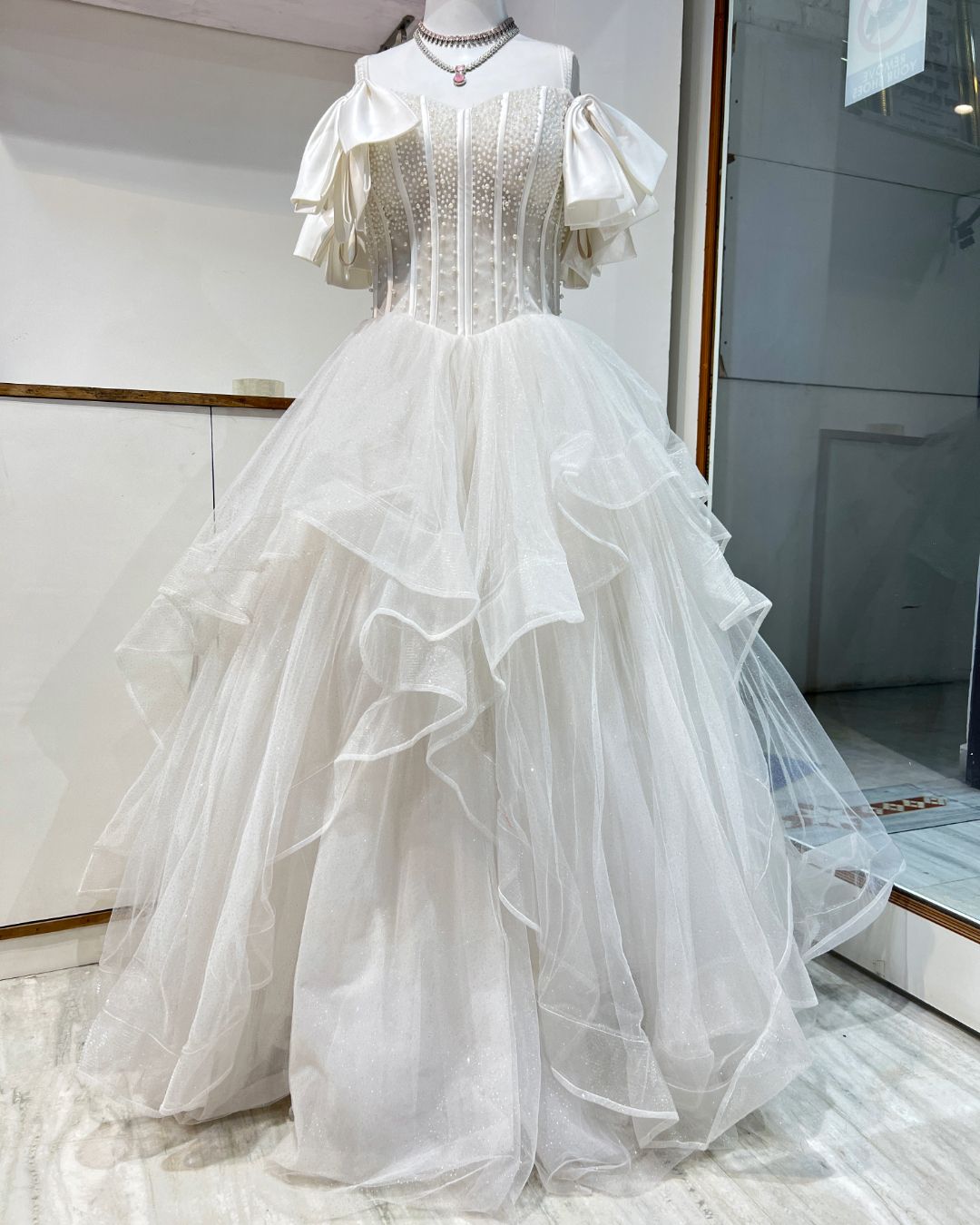 White Wedding Gown on rent with elegant bridal design