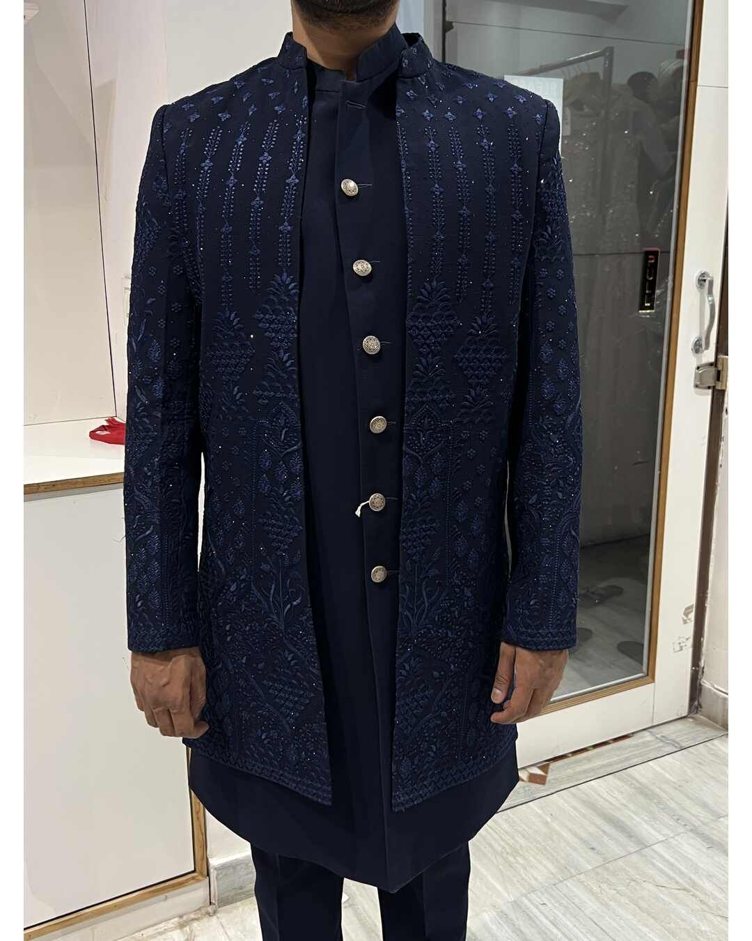 Blue Indo Western Suit for Men showcased at Fancyano Wedding Dress Rental Store, Udaipur. Explore timeless elegance and style.