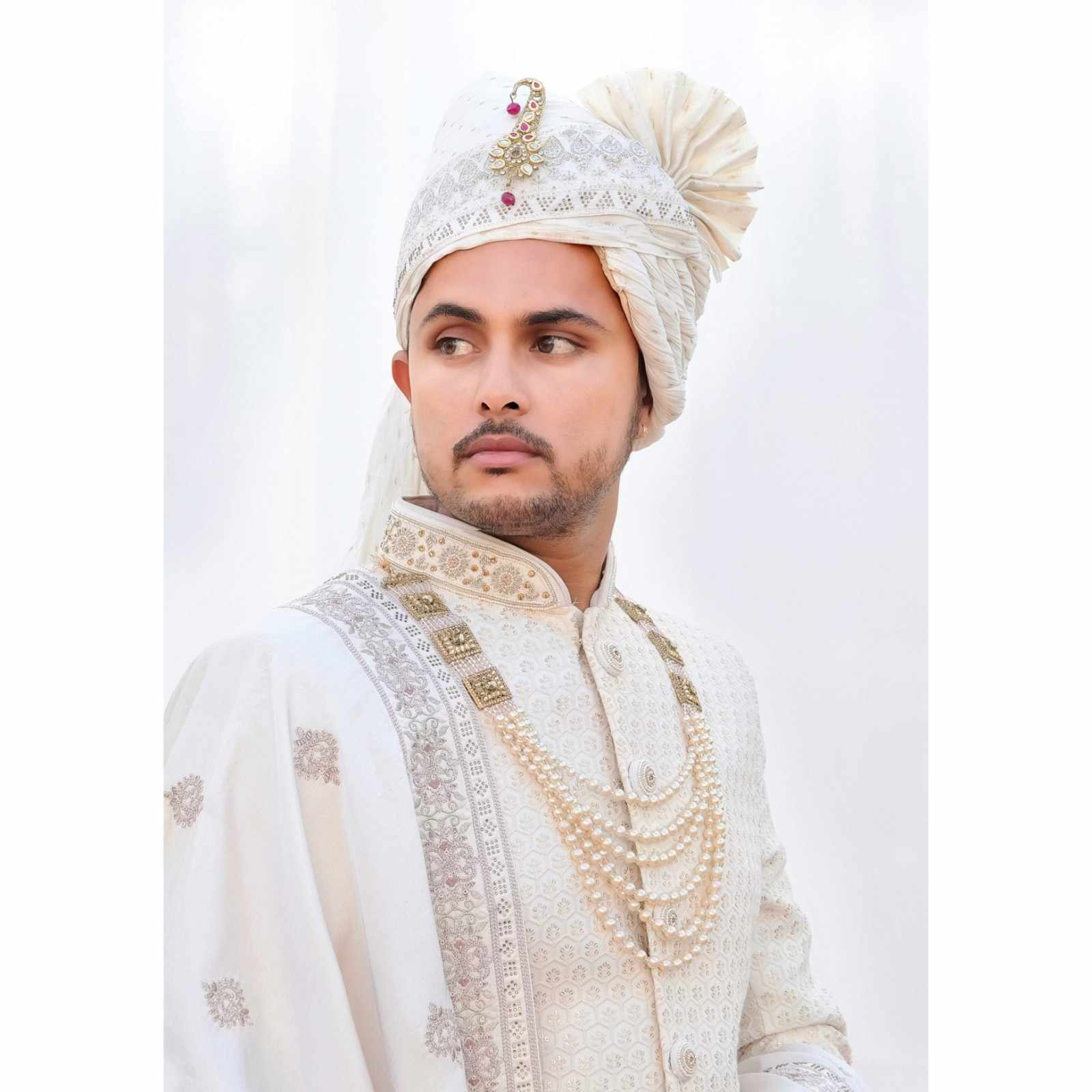 A luxurious sherwani from Fancyano's Kiraye Par Sherwani Rentals collection, exuding sophistication and elegance. Perfect for weddings and special occasions in Shobhagpura, Udaipur."