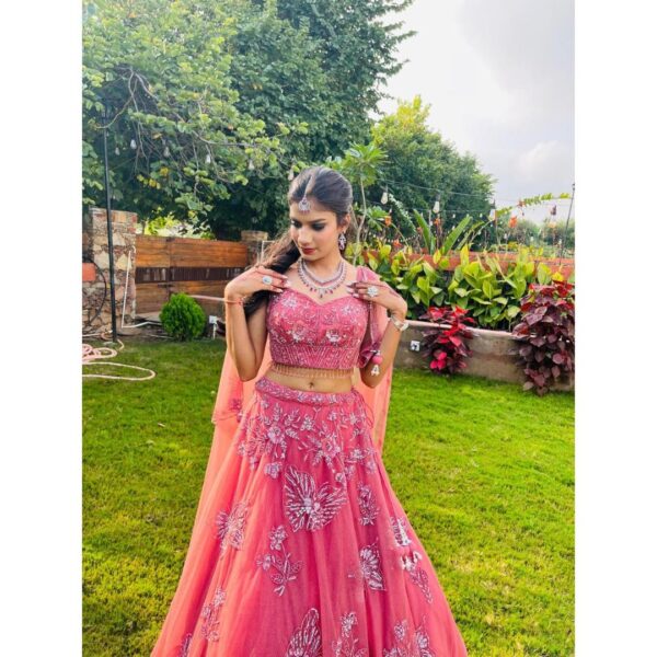 Elegant Designer Crop Top Lehenga for Rent at Fancyano, Udaipur, featuring intricate embroidery and a modern silhouette.