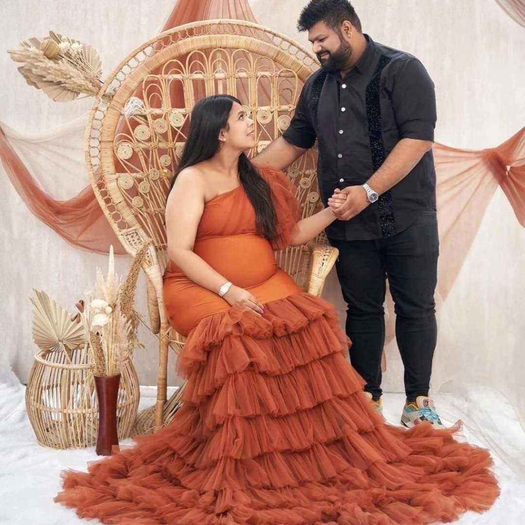 Elegant rust orange maternity dress for rent – Udaipur photoshoot outfit