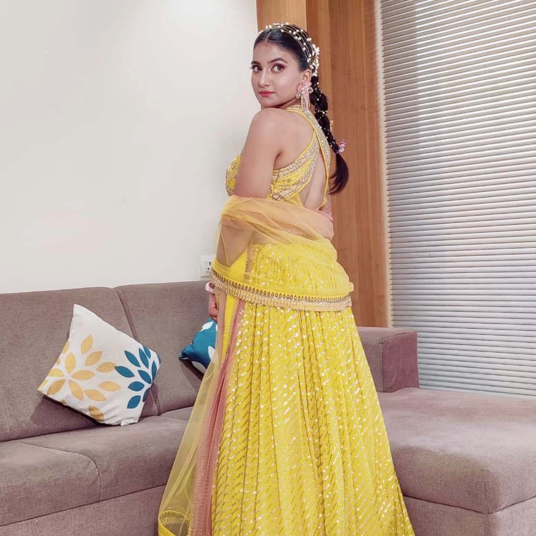 Bride wearing Yellow Crop Top Lehenga on Rent in Udaipur for Haldi function
