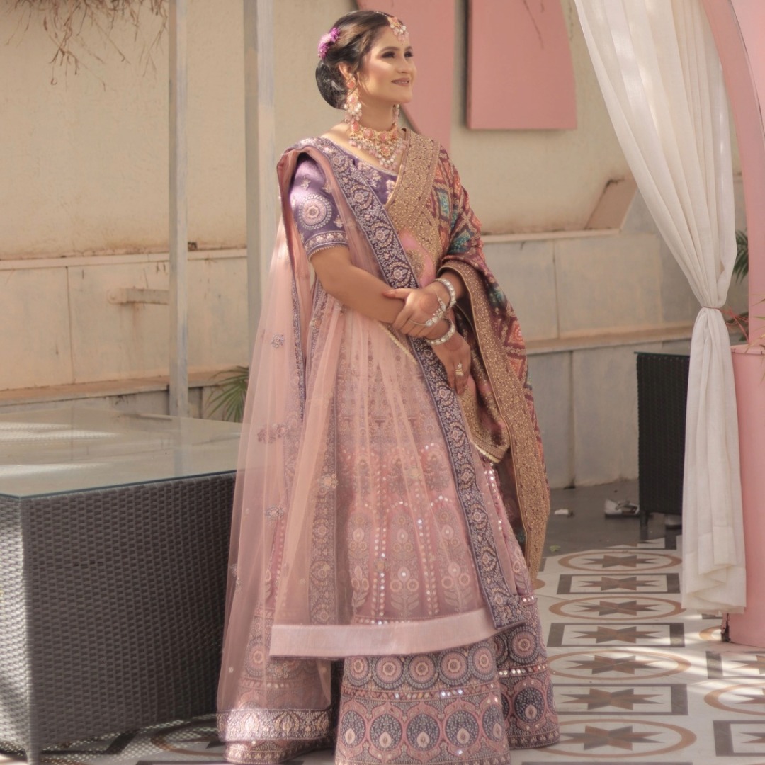 Duel shade heavy mirror lehenga for rent in Udaipur – bridal and party wear outfit at Fancyano