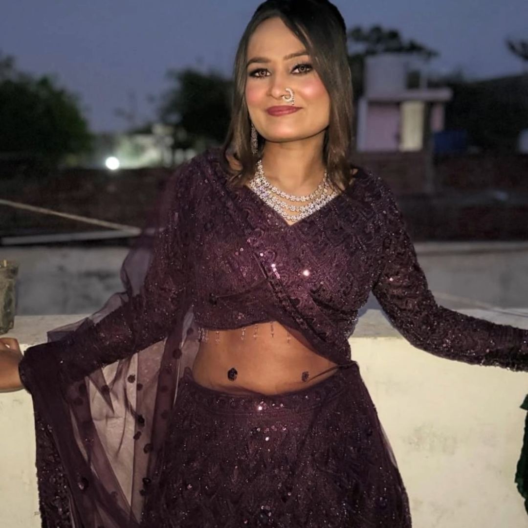 Wine fancy lehenga with full sleeve on rent in Udaipur