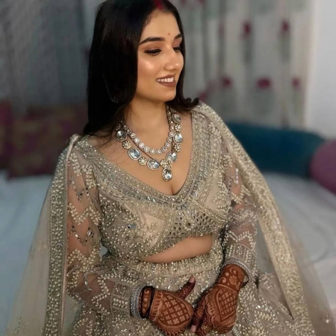 Cream pearl handwork lehenga for rent in Udaipur
