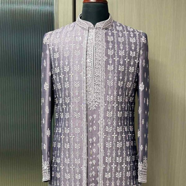 Model wearing Fancyano Rent Lavender Grey Embroidered Indo-Western for Men, available for rent, featuring intricate white threadwork.
