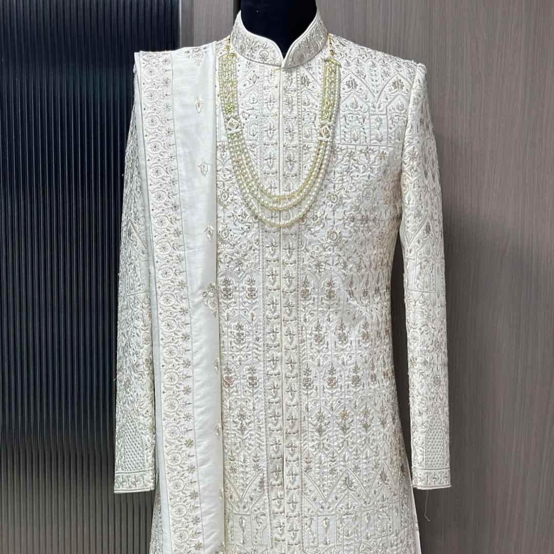 Groom wearing premium sherwani from sherwani rental shop near me in Udaipur