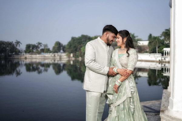 Elegant couple wearing traditional Indian attire – Rent Lehenga & Jodhpuri Combo Dress for royal-themed photoshoots