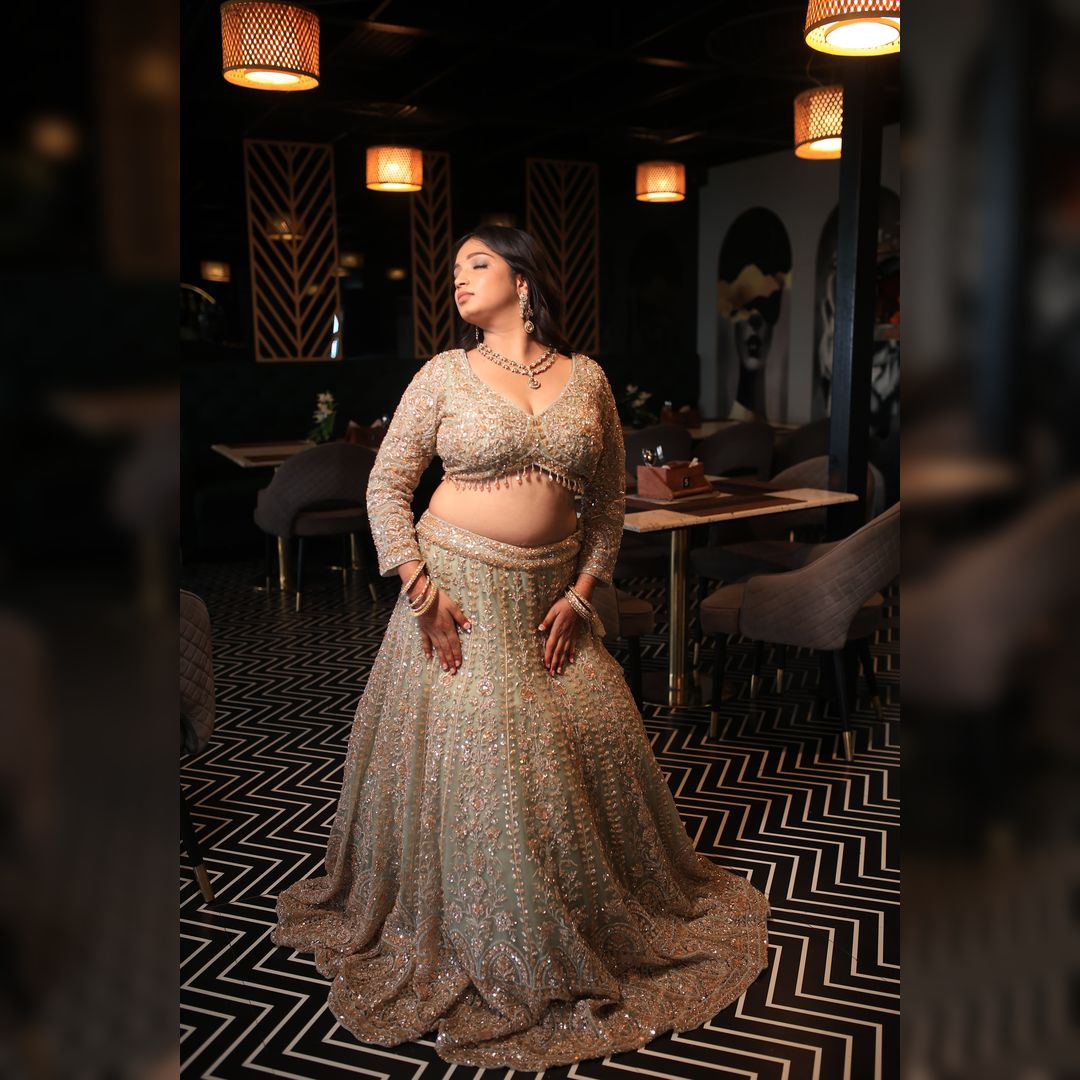 Elegant Pista Golden Hand Lehenga rental for weddings in Udaipur