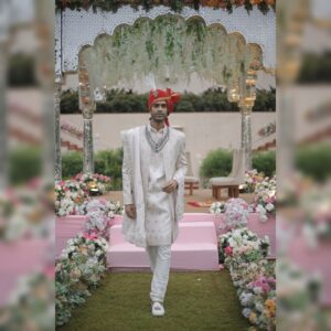 groom wearing ivory wedding sherwani from best sherwani rental store in udaipur fancyano