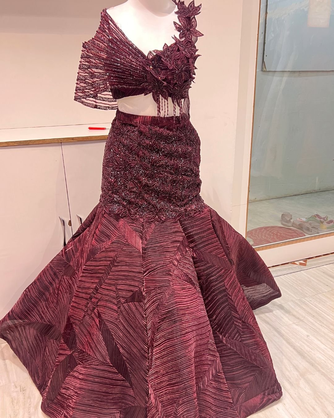 Designer fish cut lehenga for reception rental in Udaipur for wedding and glamorous evening celebrations