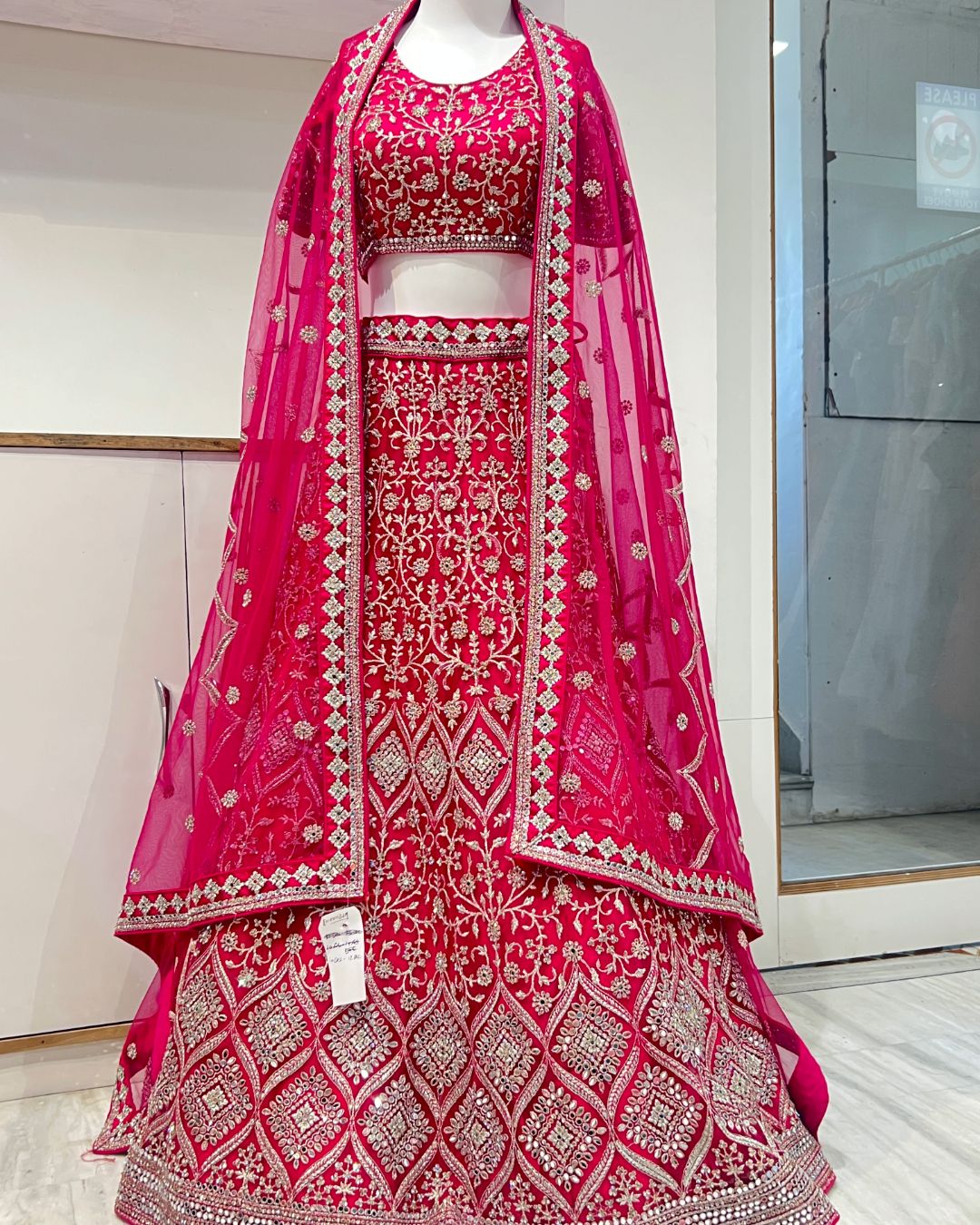 "Enchanting Mirror Work Lehenga Rentals - Elevate Your Style with Timeless Charm"