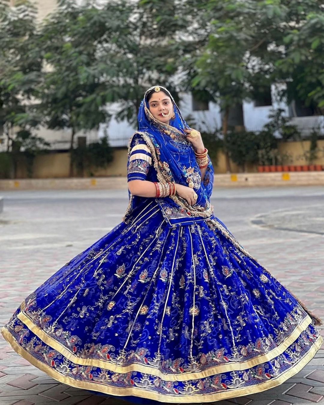 Elegant blue traditional lehenga for pre wed shoot in Udaipur for romantic couple photography