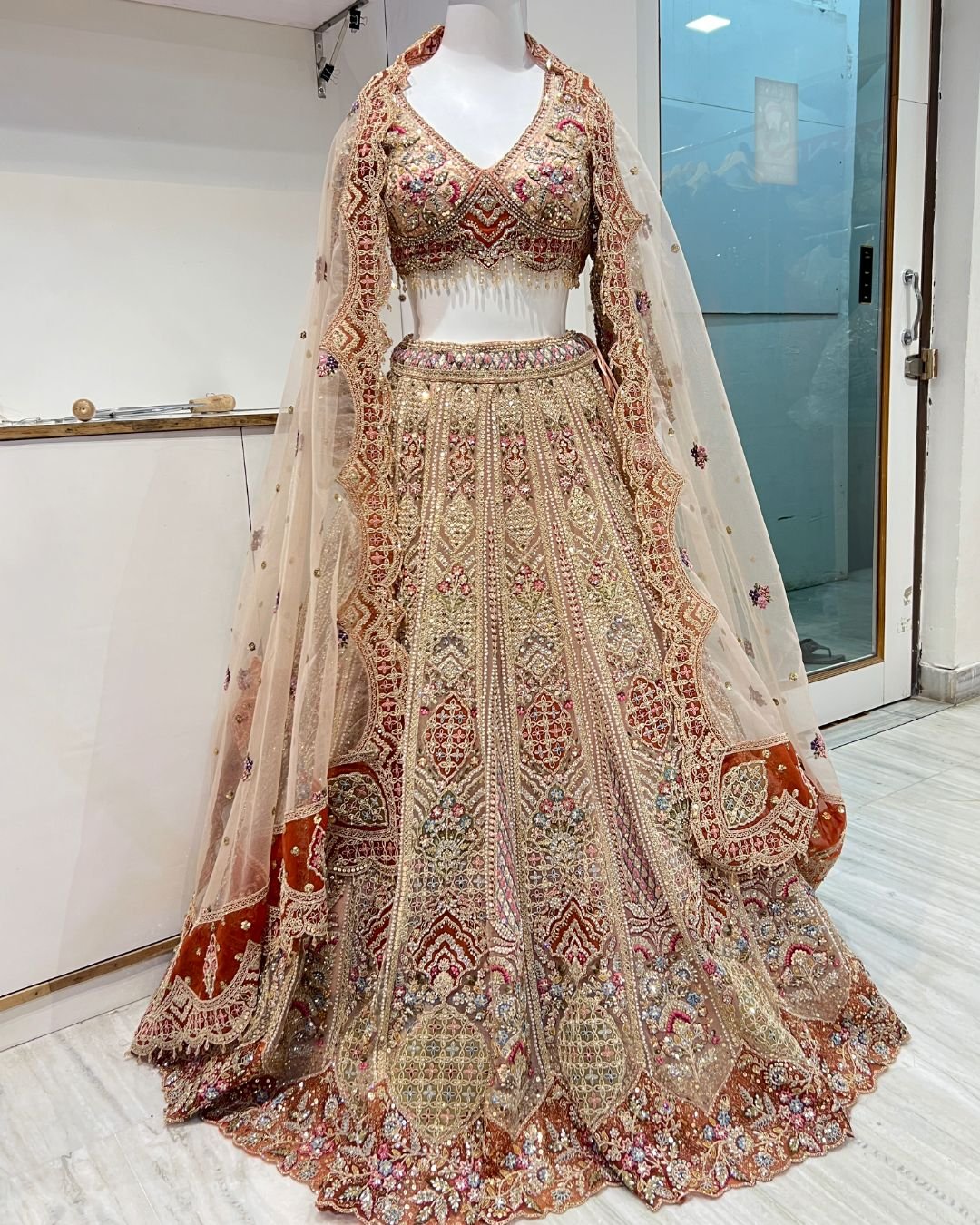 tylish multicolour bridal reception heavy lehenga rental in Udaipur for wedding receptions and bridal celebrations