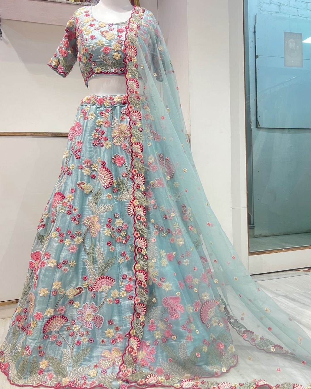 Elegant flowery lehenga rent shop collection for weddings and festive celebrations