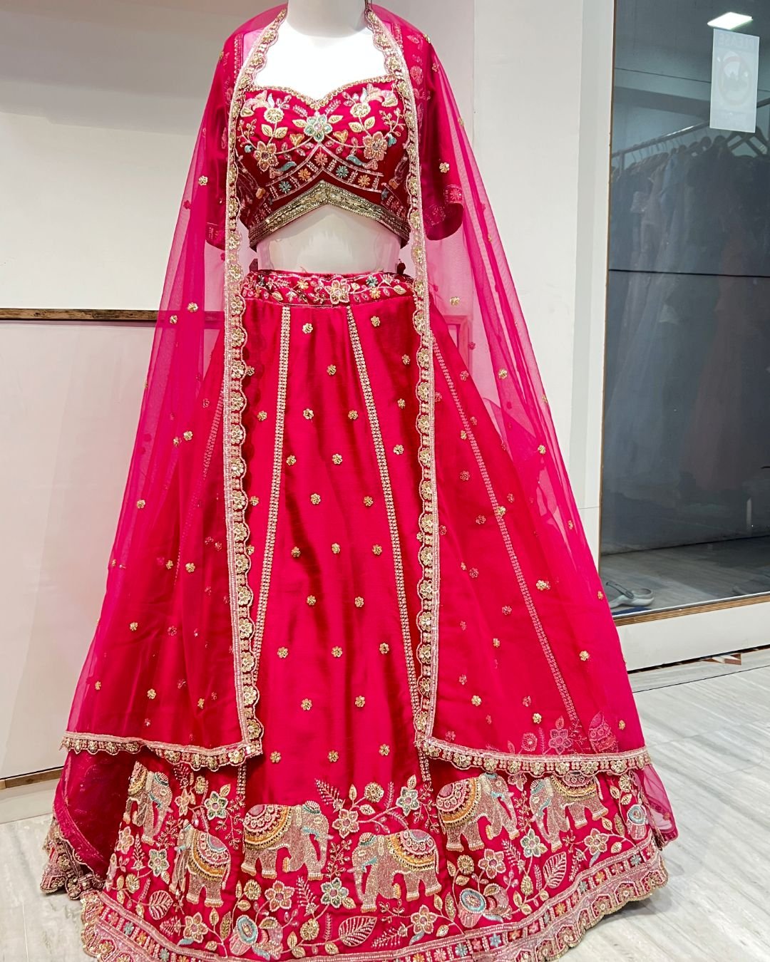 Beautiful rani lehenga with pipe work for weddings and festive celebrations