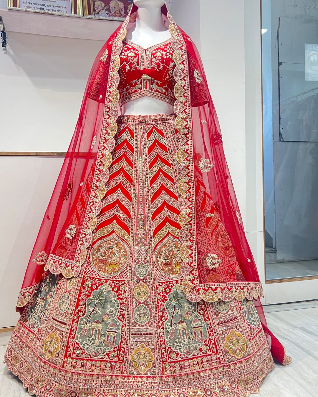 Elegant rent red silk bridal lehenga choli for bridal weddings and traditional celebrations