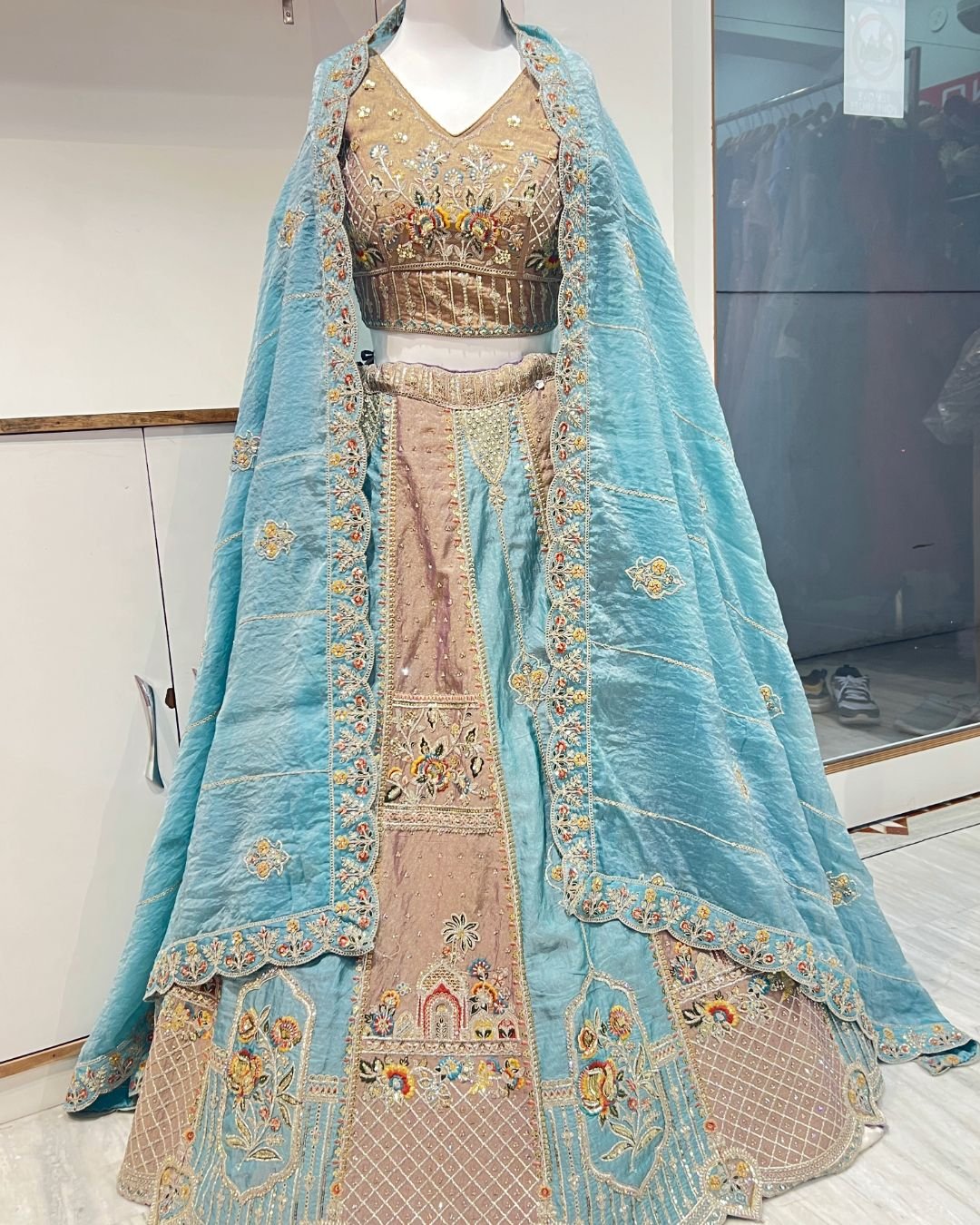 Beautiful blue multicolour lehenga rental for weddings and festive celebrations